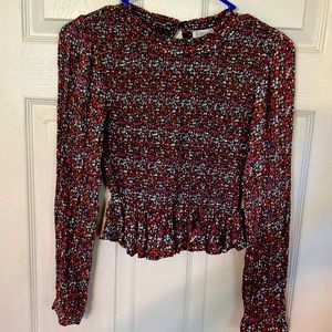 Gently worn Patrons of Peace shirt. Size small